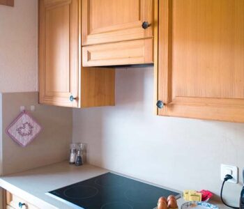 Fully fitted kitchen with induction hob