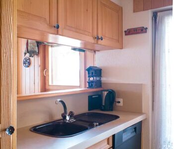Kitchen with hatch to dining area and lounge